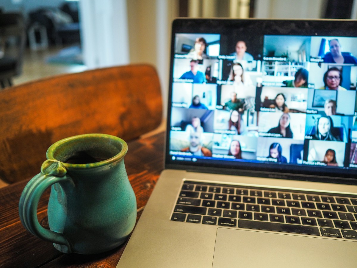 An adult joining an online training session by video call